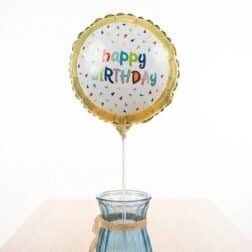 Colorful "Happy Birthday" foil balloon for celebration.