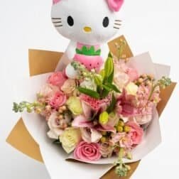 Pastel flower bouquet with strawberry plushie - Forever Floral Gifts