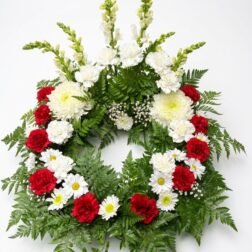Red carnation and white chrysanthemum funeral wreath - Forever Floral Gifts